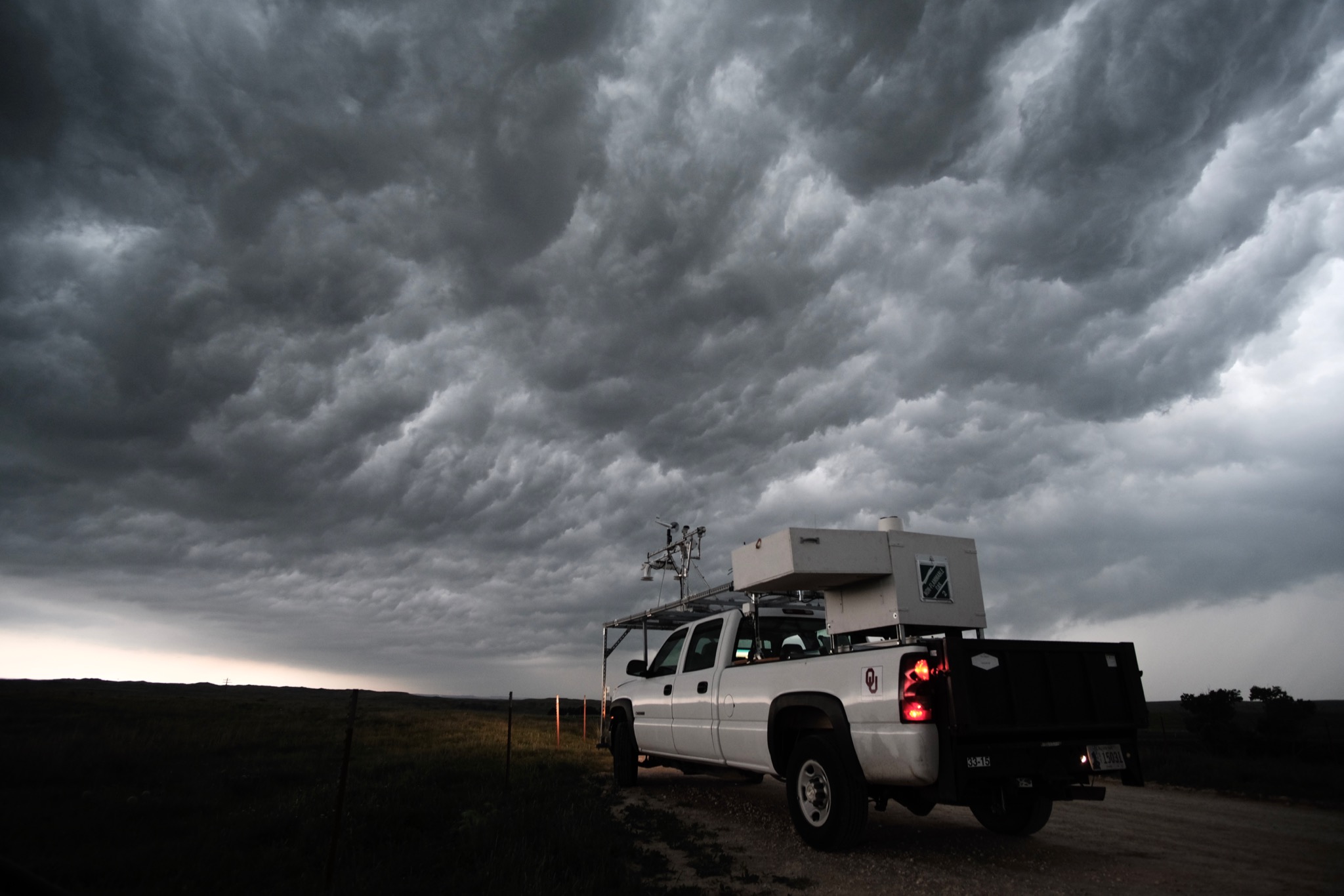 The LiDAR system pick-up truck in front of a storm.