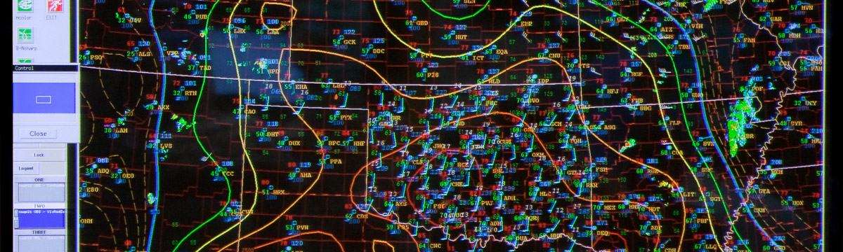 Radar image of Oklahoma and surrounding states, with weather symbols overlaid.